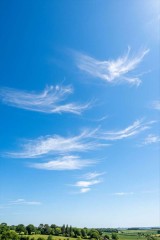 blue sky wispy clouds